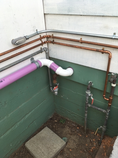 Grey water collection piping in private home